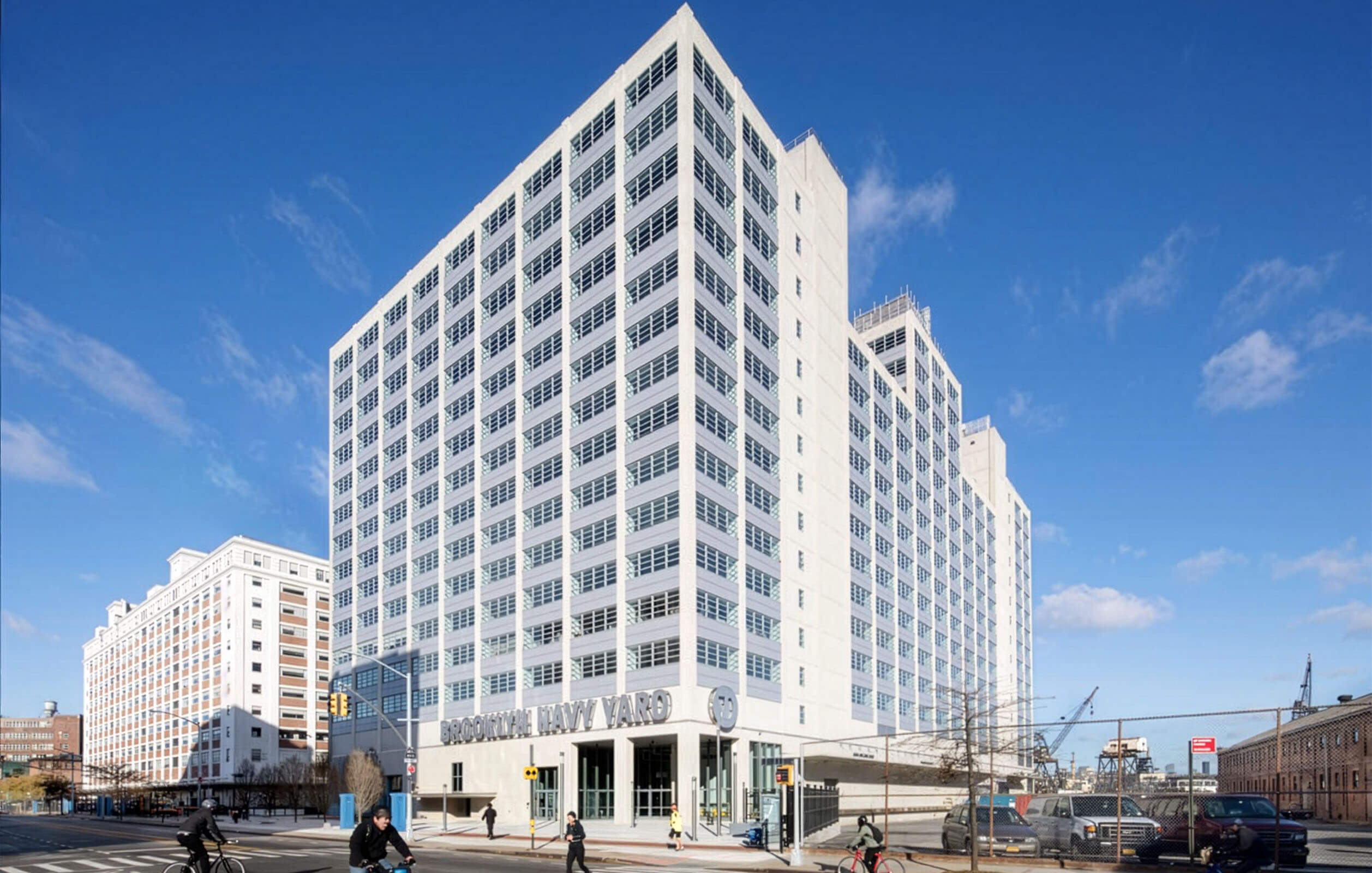 Exterior shot showing the hundreds of windows of the Brookyn Navy Yard's Building 77