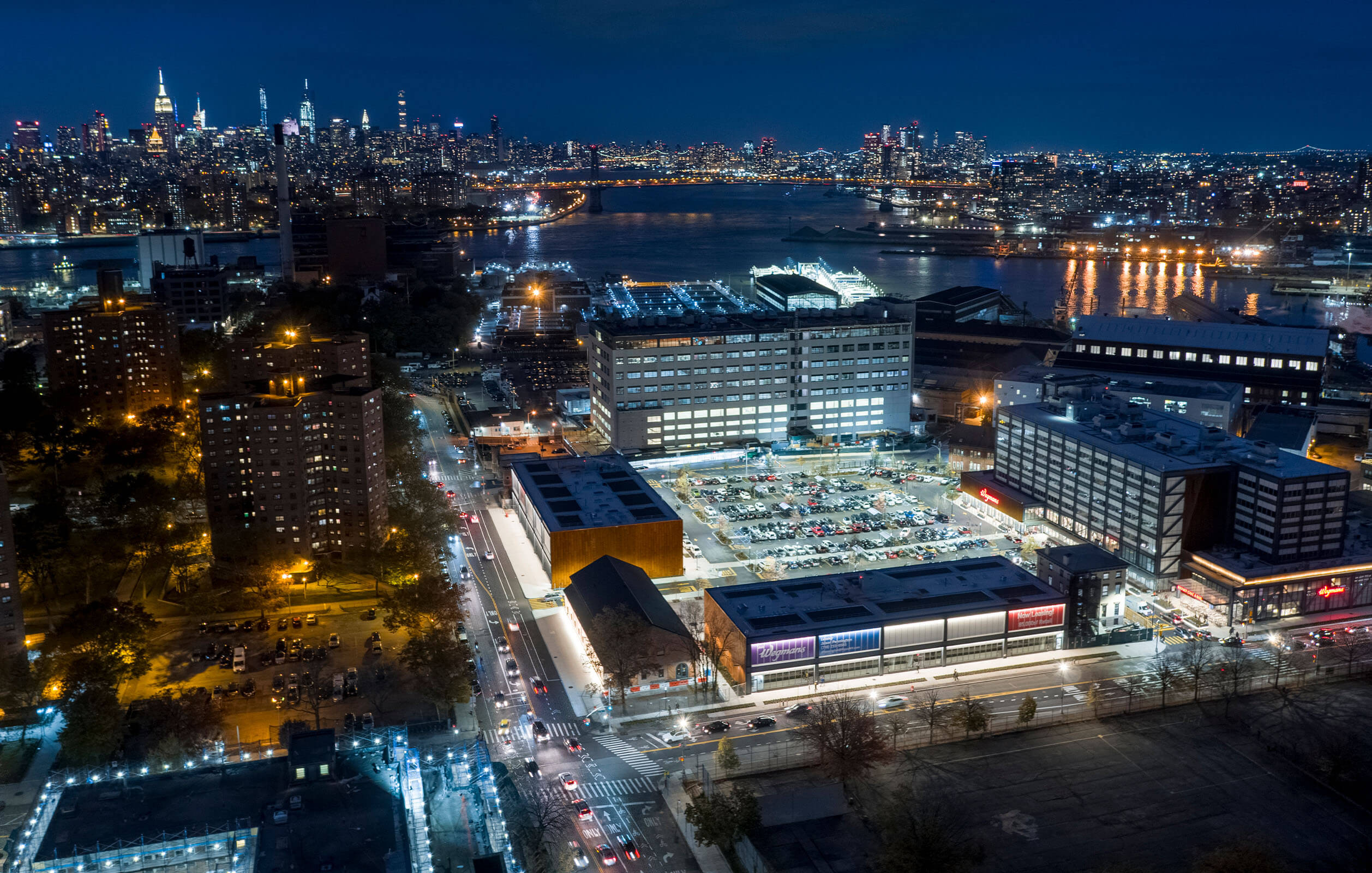 Aerial night view of the Admirals Row development in the Brooklyn Navy Yard