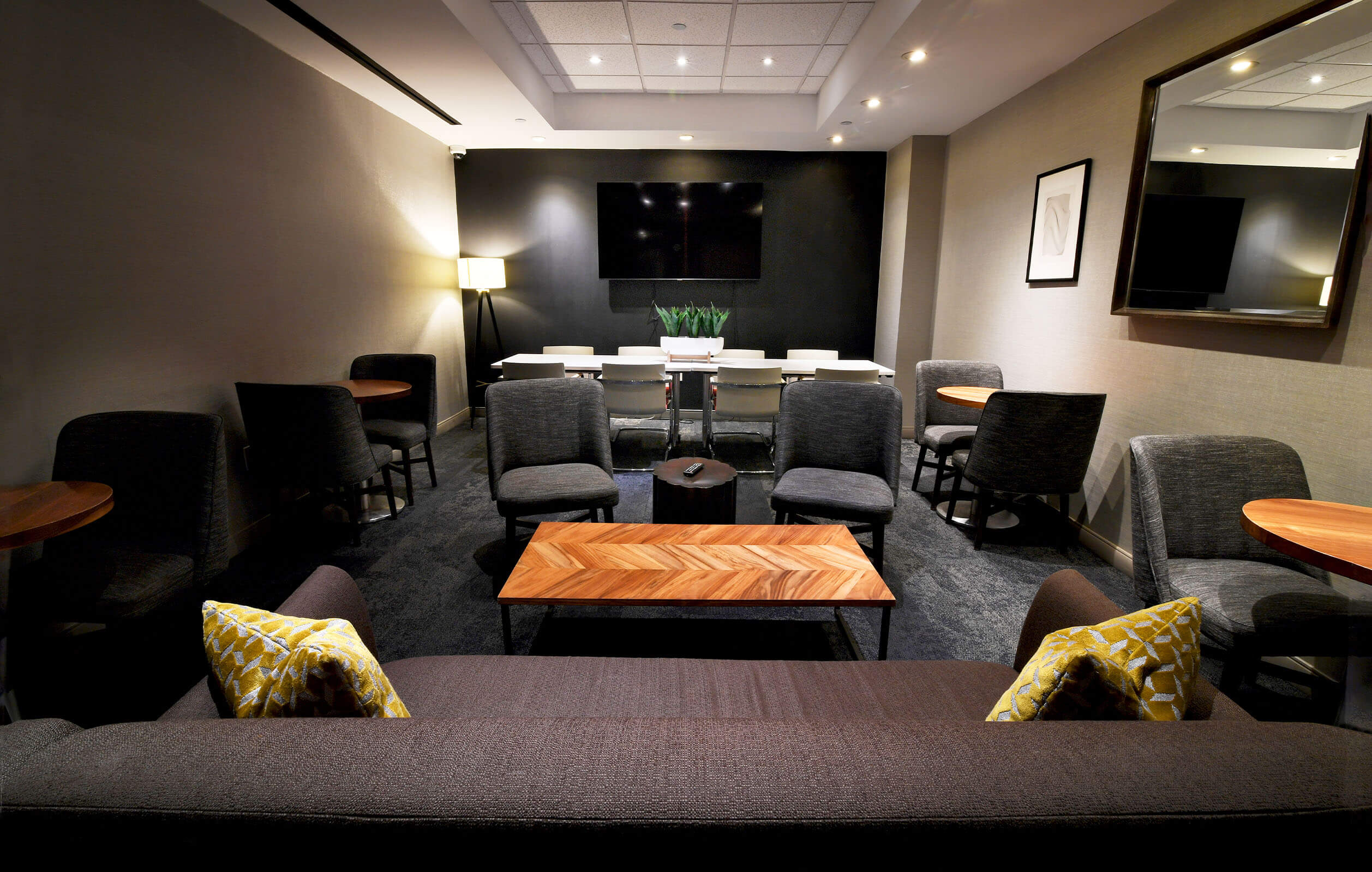 Chairs and couches inside the Edge Hotel's business center