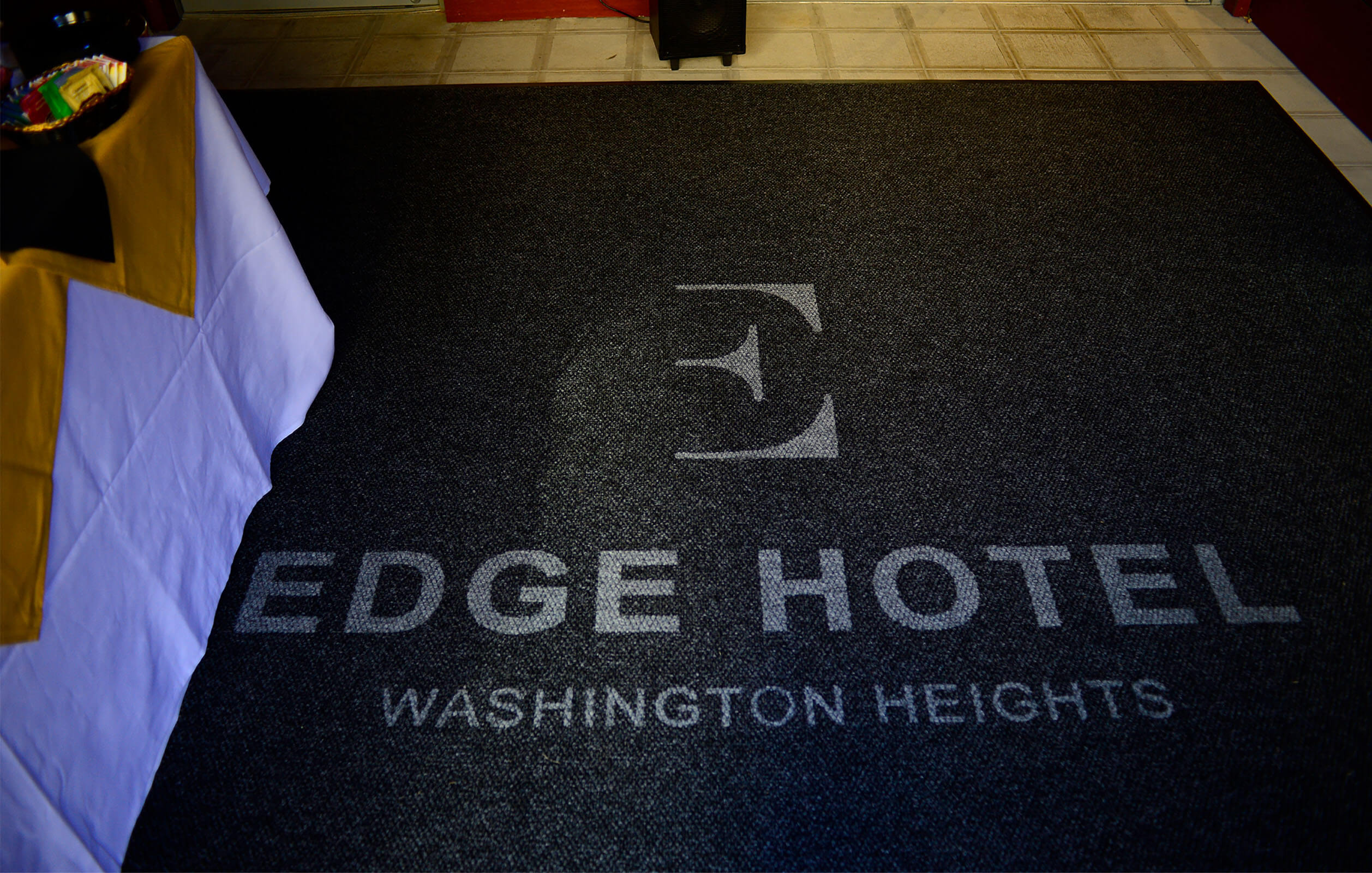 Welcome mat in the entrance lobby of the Edge Hotel