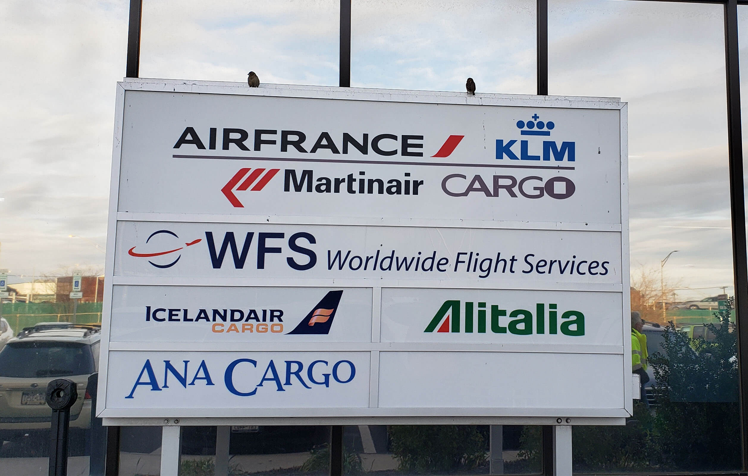A sign showing the airlines serviced by CAS inside the general warehouse facility in the ARK at JFK complex