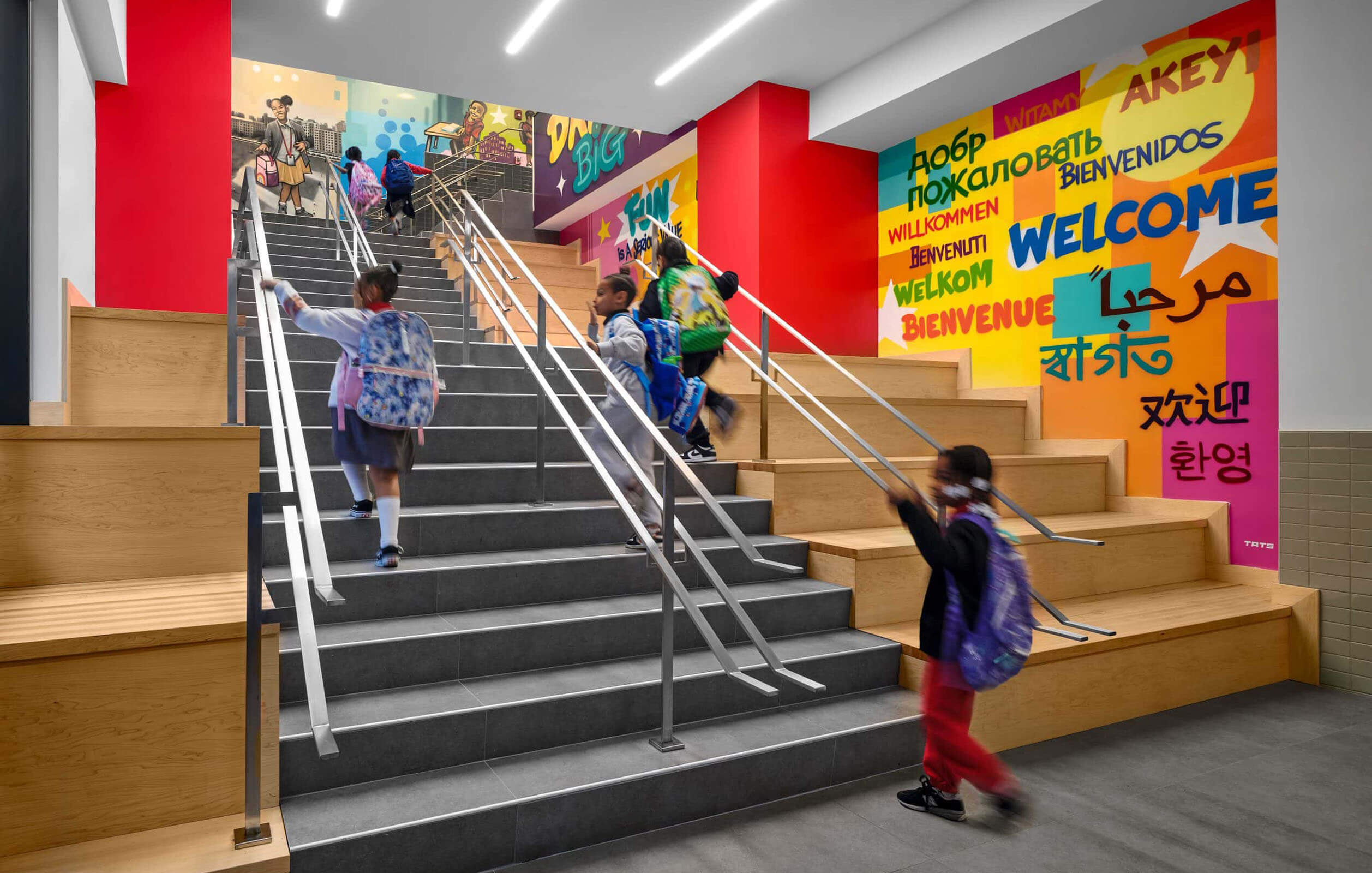 Students walking up the stairs at the DREAM HIghbridge Charter School in the Bronx
