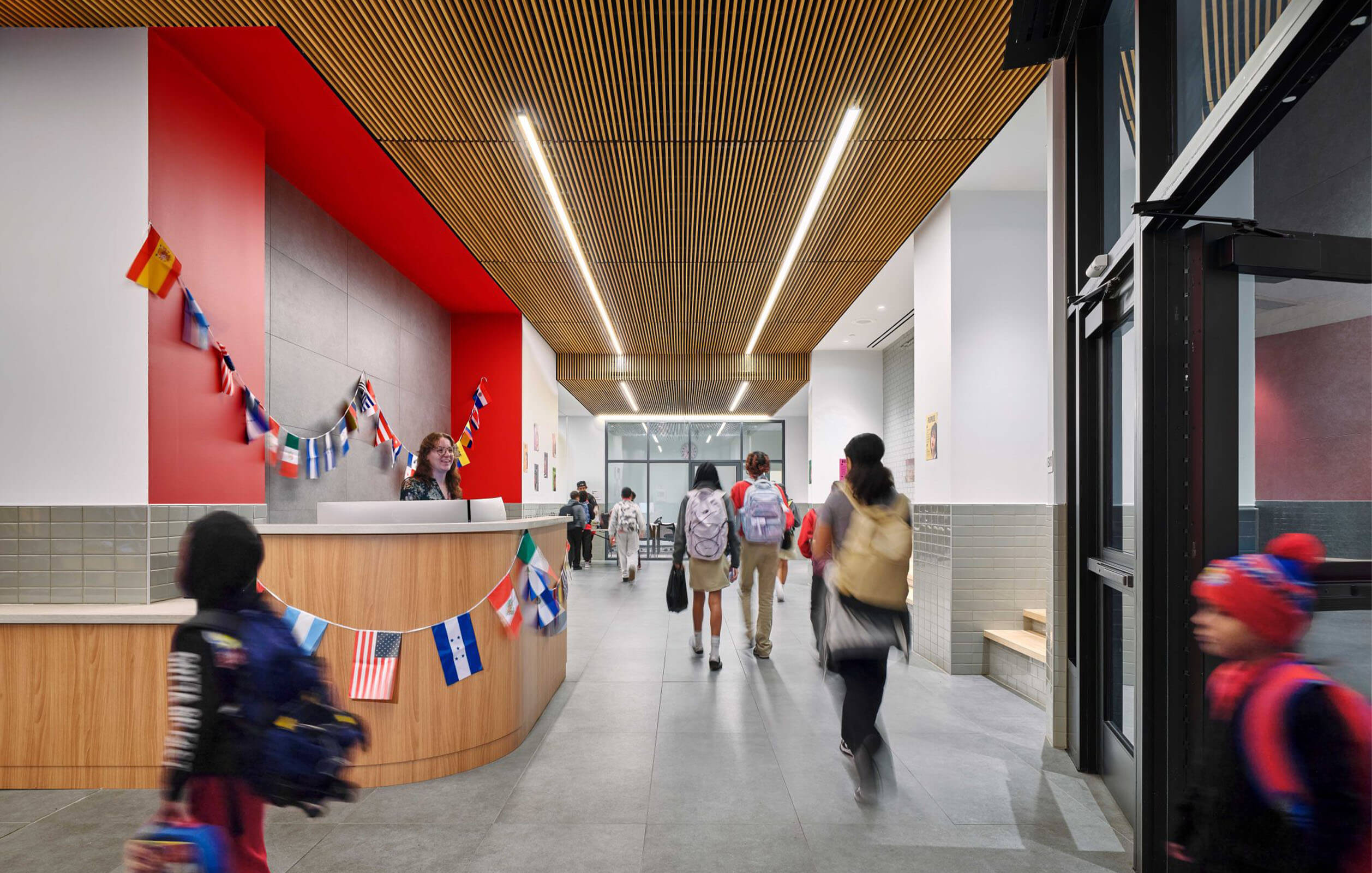 Students walking in the hallways between classes at the DREAM Highbridge Charter School in the Bronx