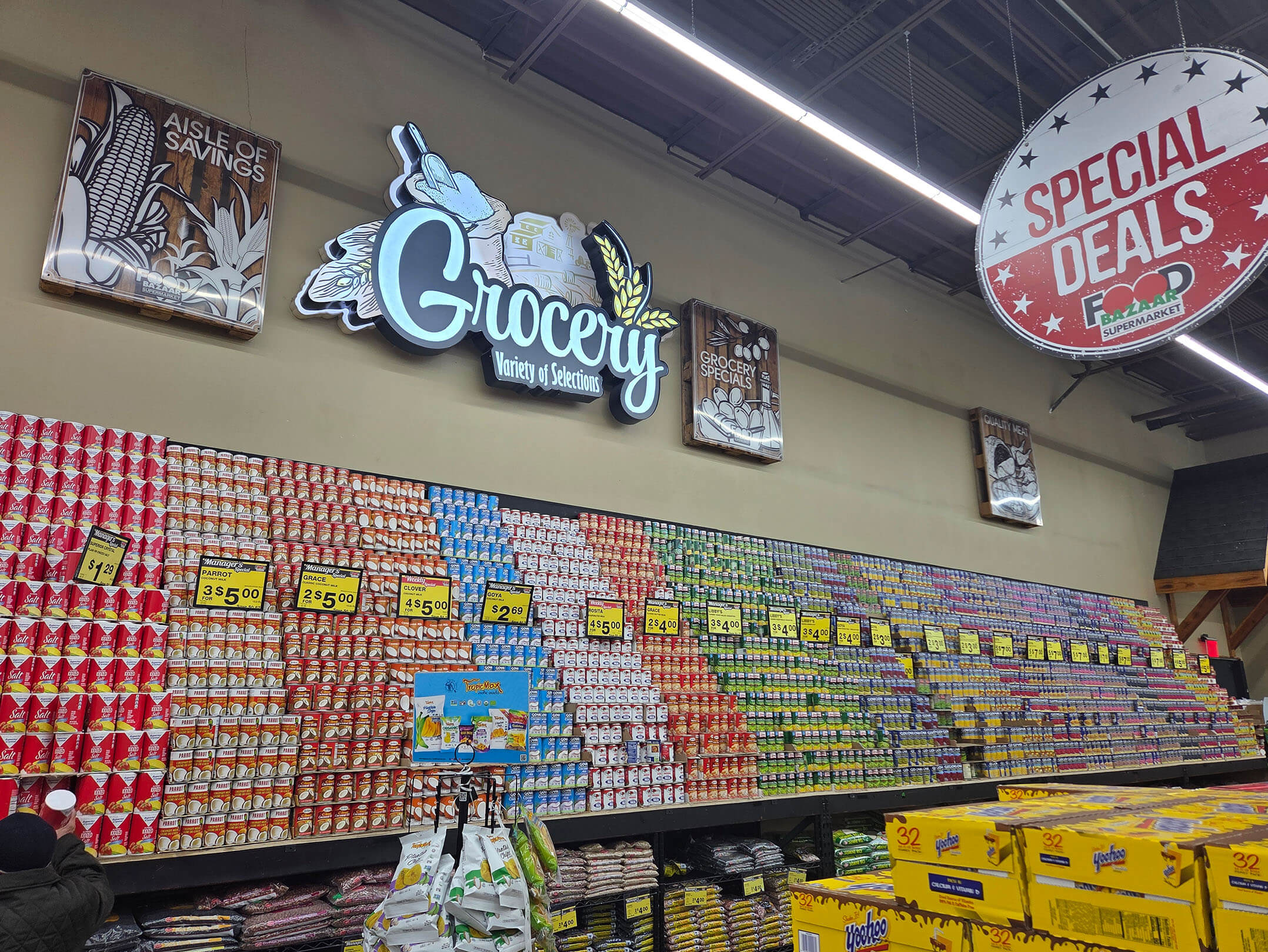 Wall stacked with canned goods at the Food Bazaar supermarket
