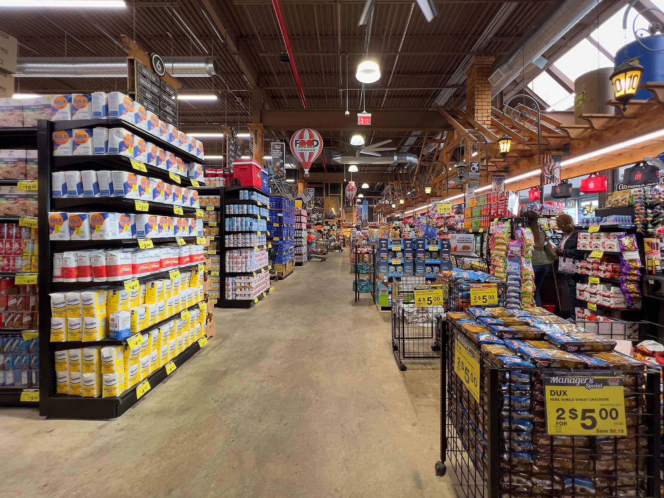 Spacious aisles of goods at the Food Bazaar supermarket in the East New York section of Brooklyn