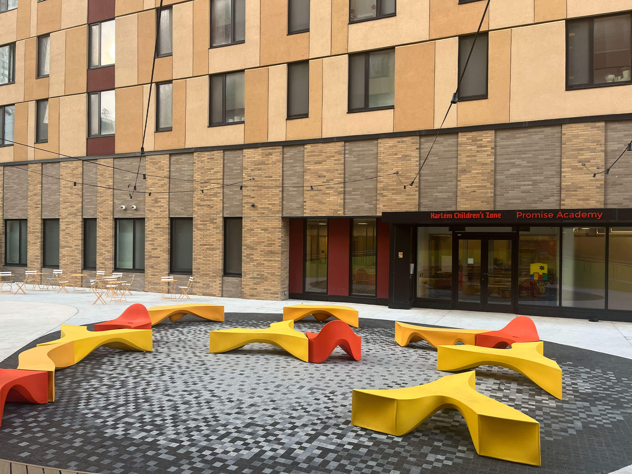 Outdoor sitting area in the back of Promise Academy II in Harlem