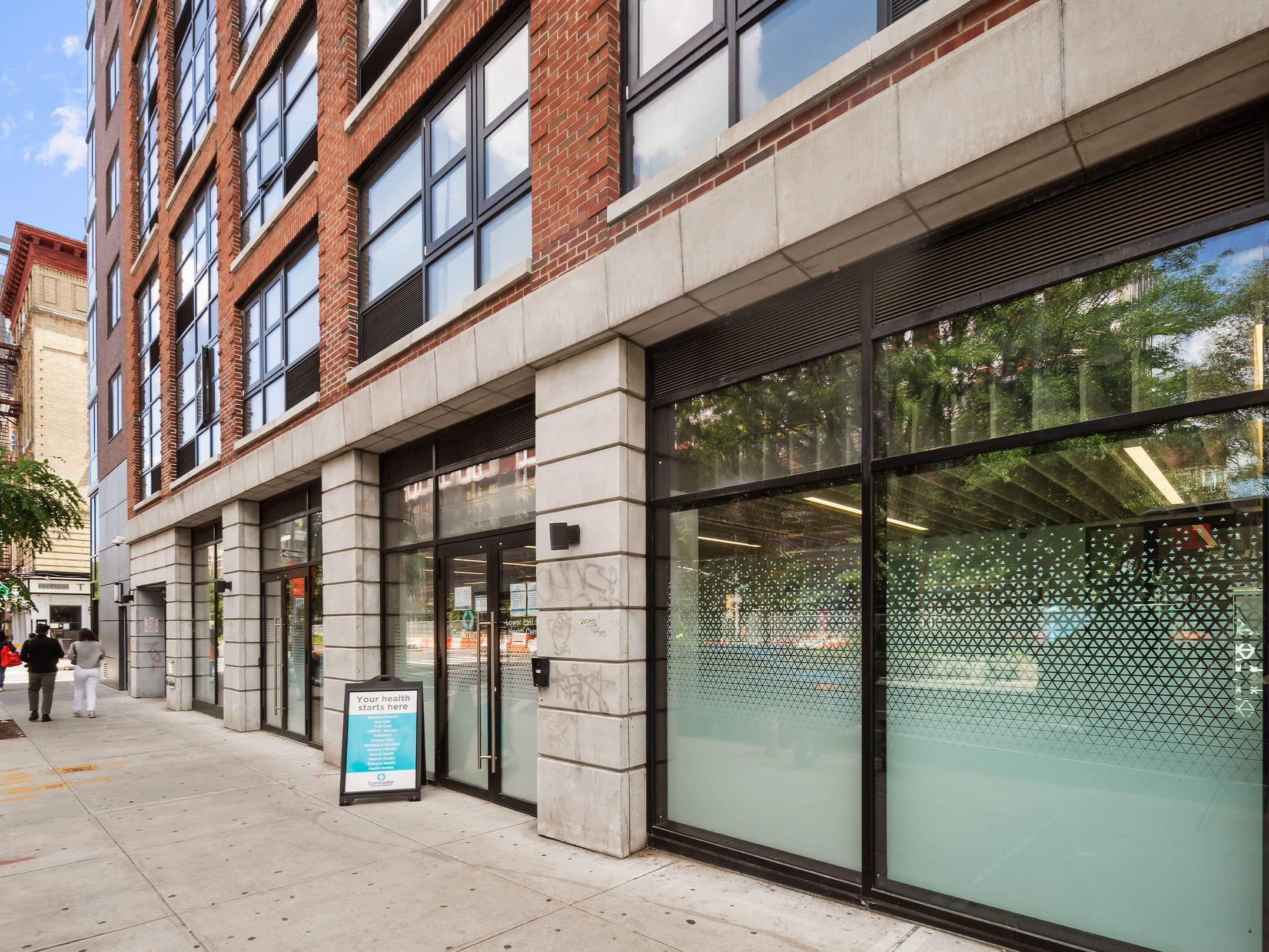 Street-level view of the entrance of the Community Healthcare Network in Manhattan