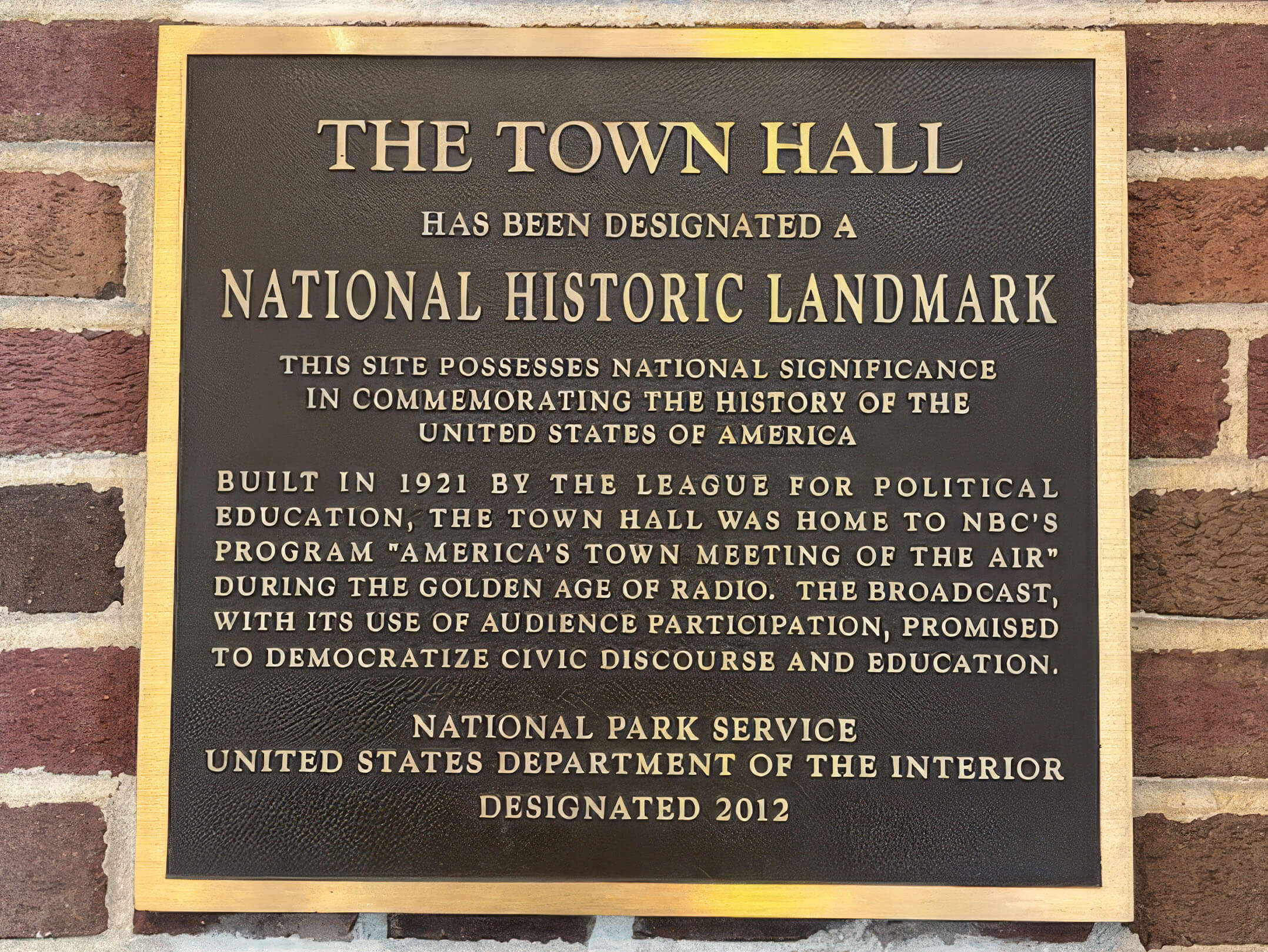 Plaque commemorating the national historic landmark designation of The Town Hall
