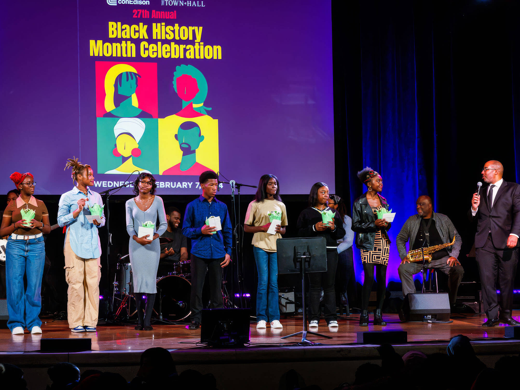 Students performing on stage at The Town Hall