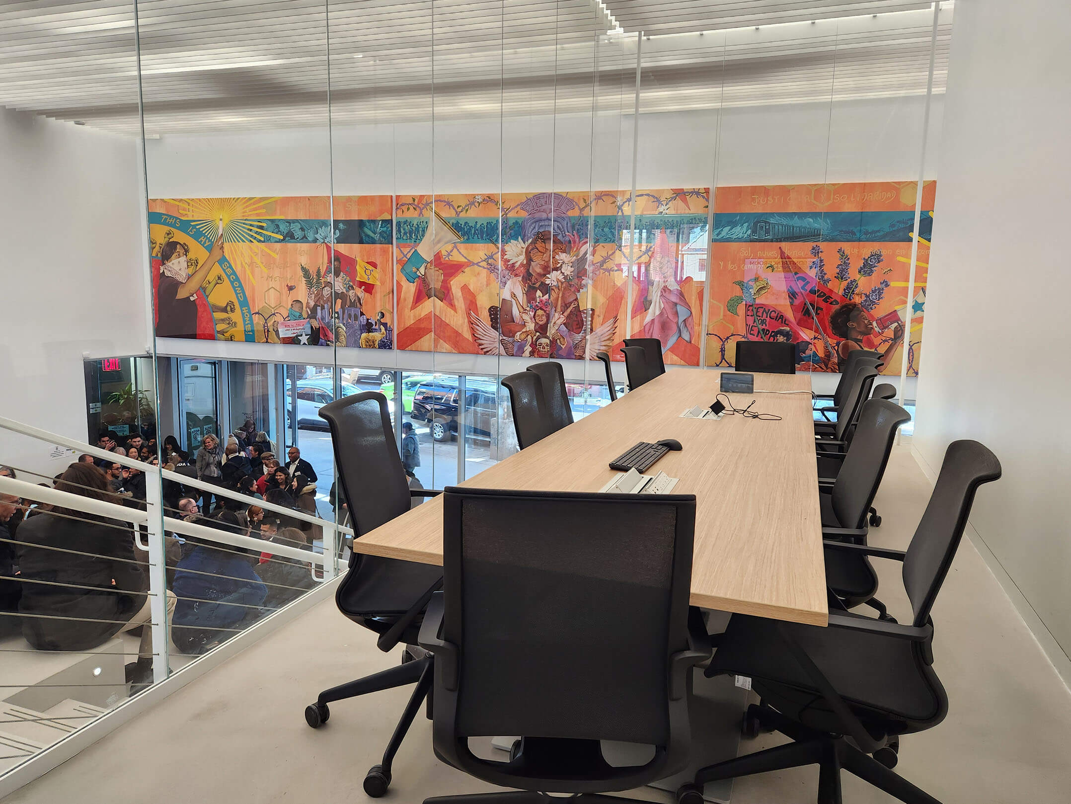 Glass enclosed conference room at Make the Road New York's community center in Queens