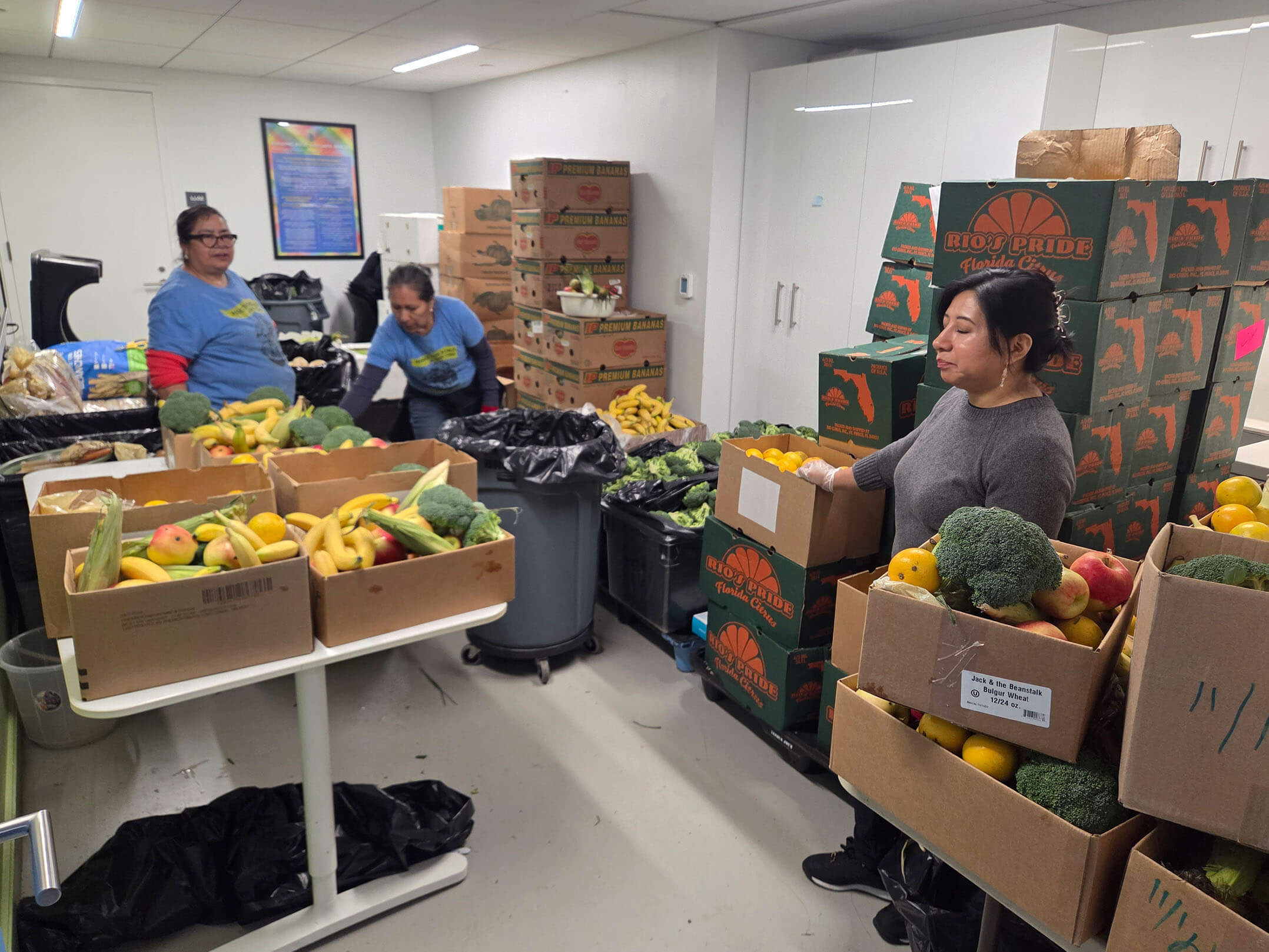 People working at the food pantry at Make the Road New York's community center in Queens