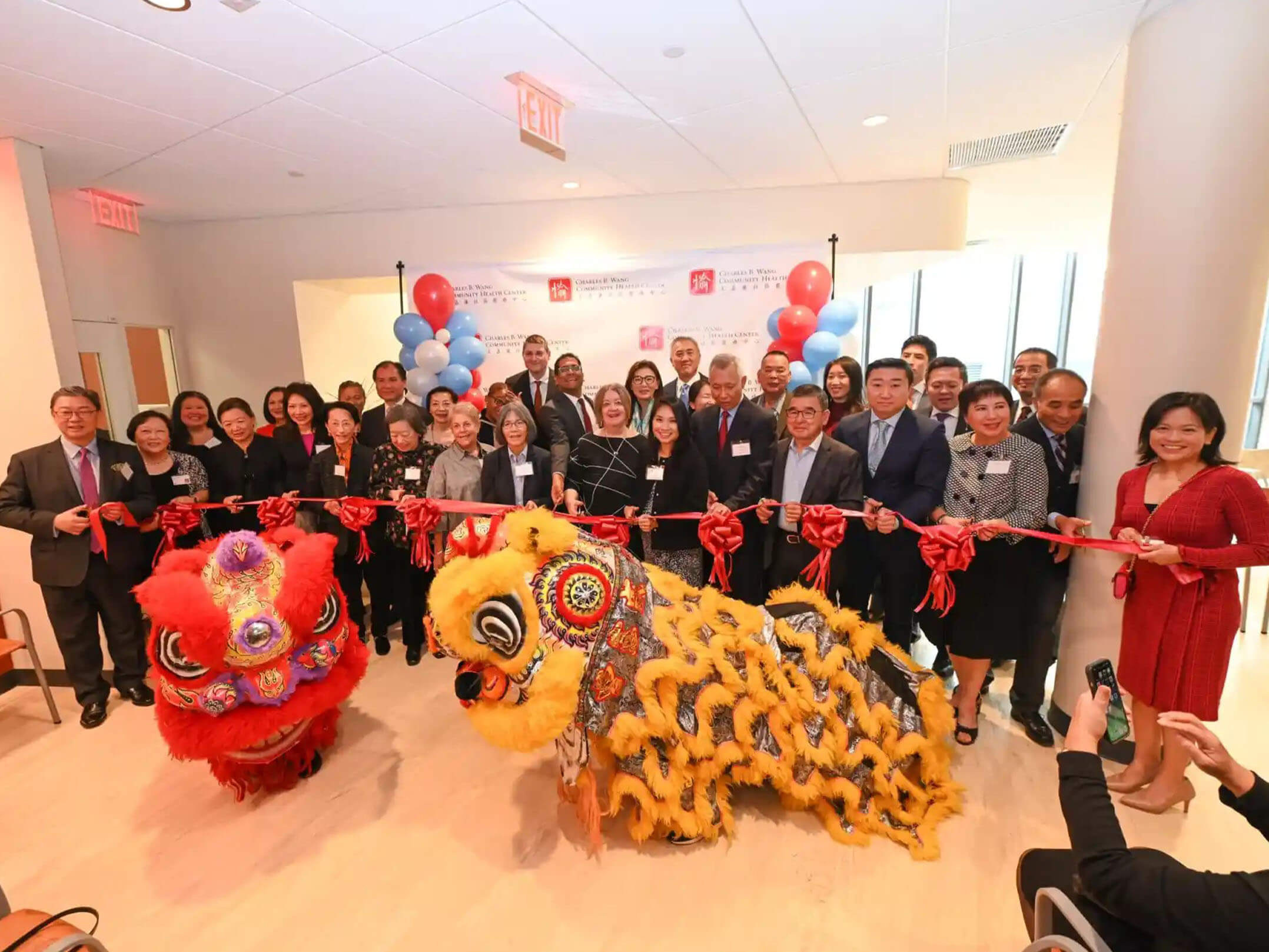 Ribbon cutting ceremony celebrating the grand opening of the Charles B. Wang Community Health Center in Flushing, Queens
