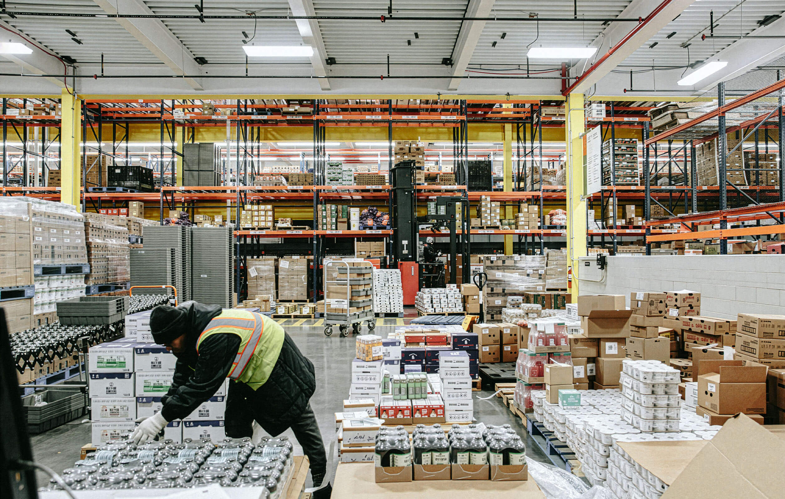 Man working in Fresh Direct's distribution center