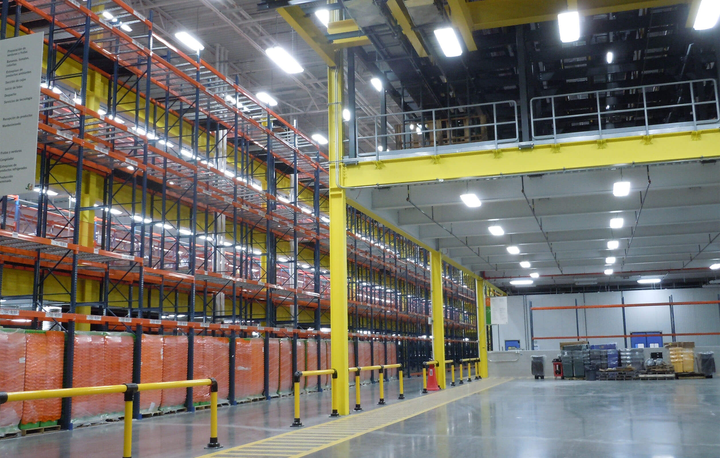 Walkway surrounded by huge stacks in Fresh Direct's huge 750,000 square foot warehouse