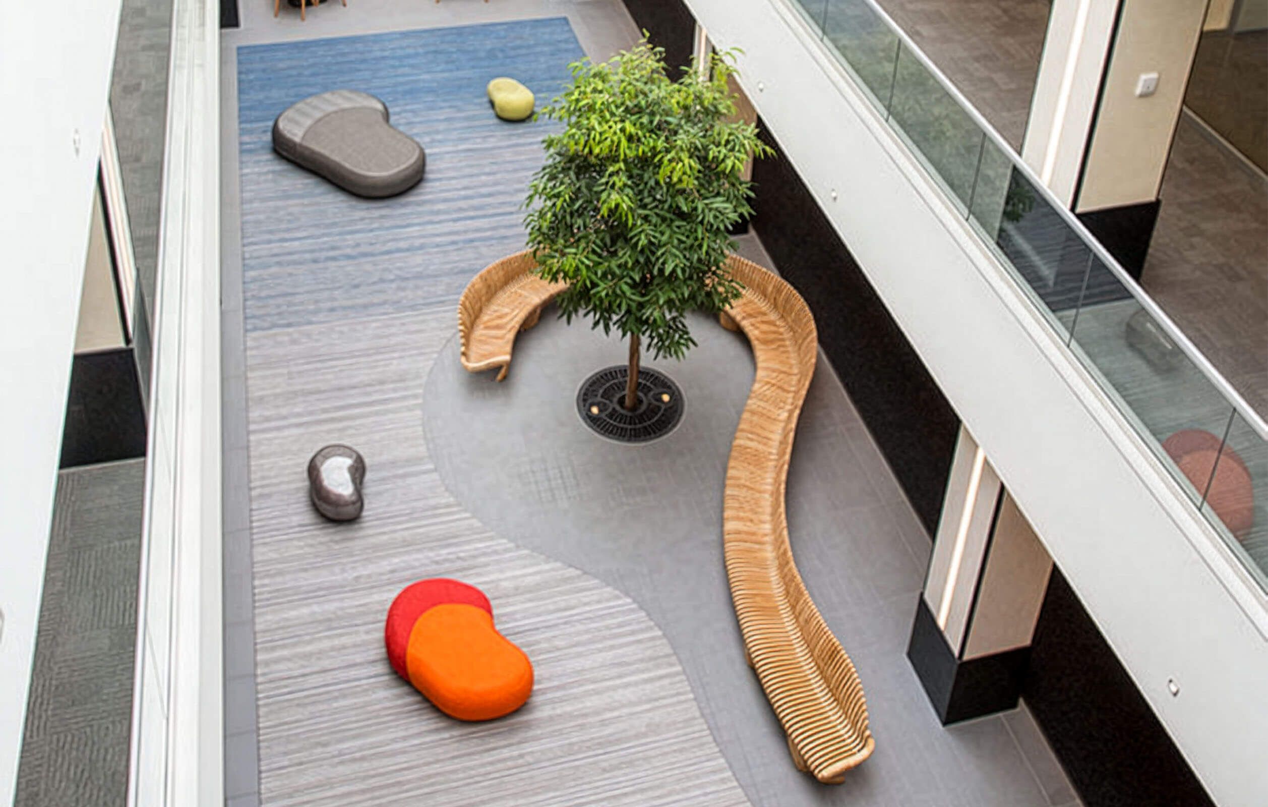 View of multi-level floors surrounded by glass atrium at the Metro Center Atrium's office complex