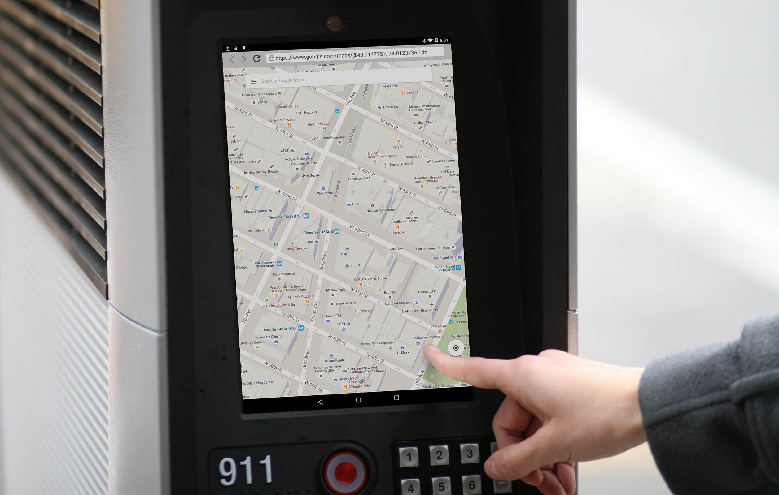 A person touching a LinkNYC screen displaying a map