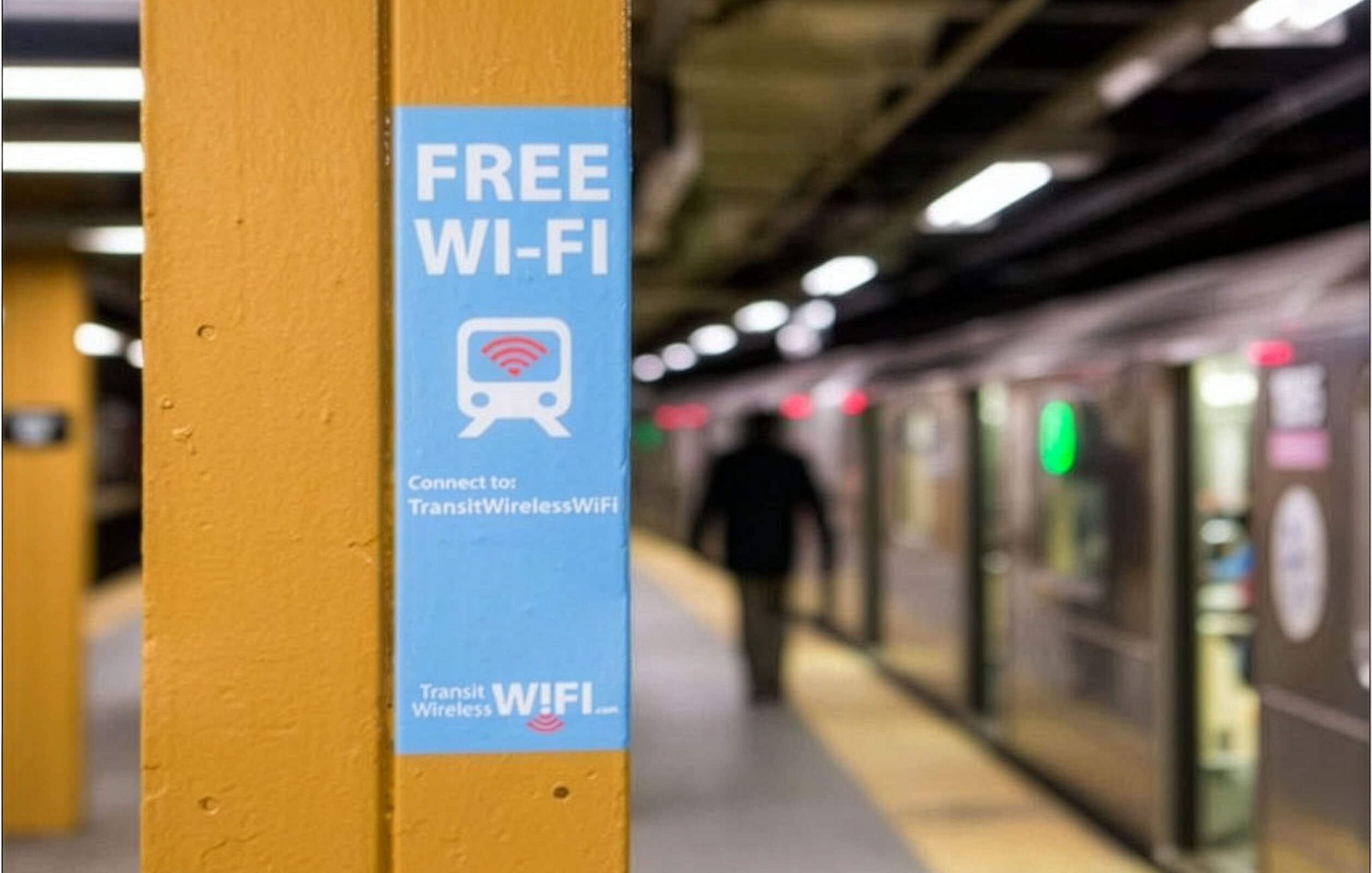 Sticker in New York City subway station saying the station has free Wi-Fi