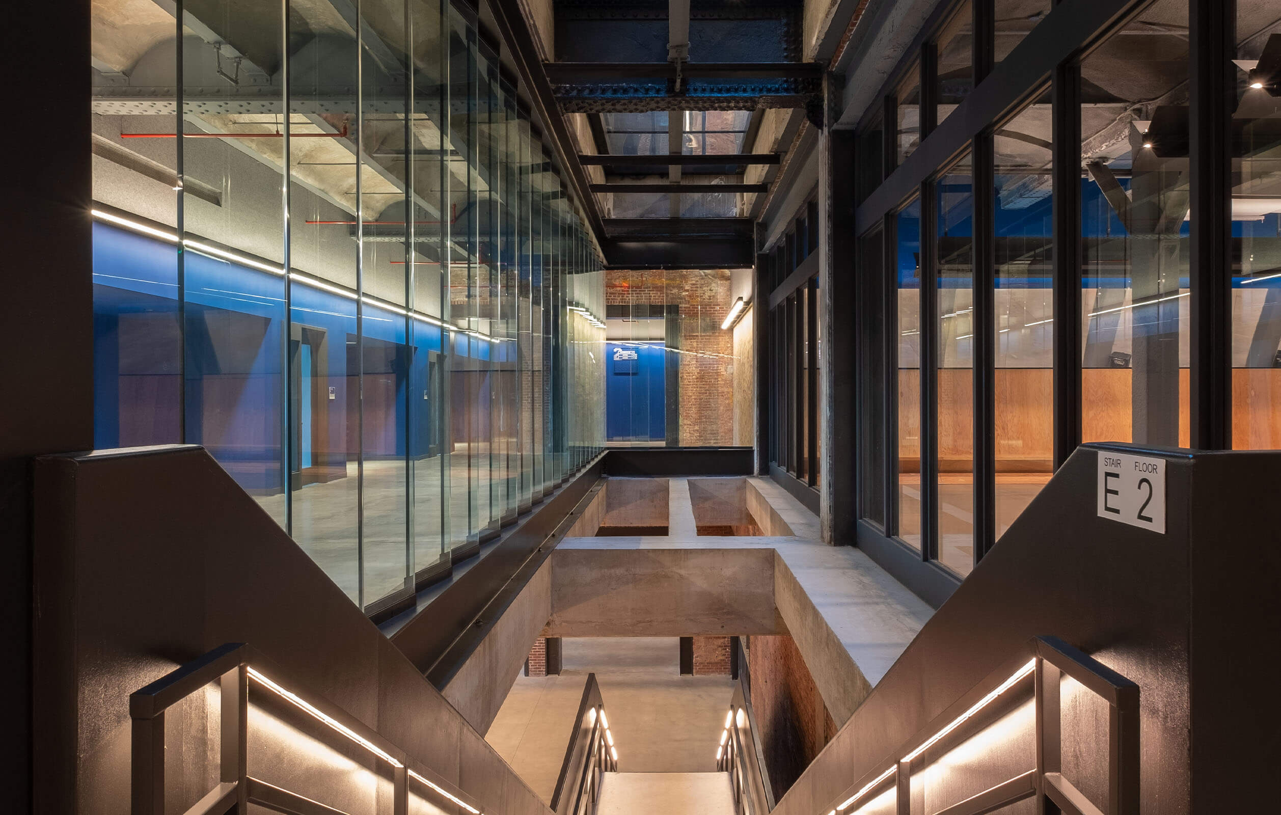 Iconic soaring architecture displayed in the glass-enclosed hallway of the DREAM Charter School in the South Bronx